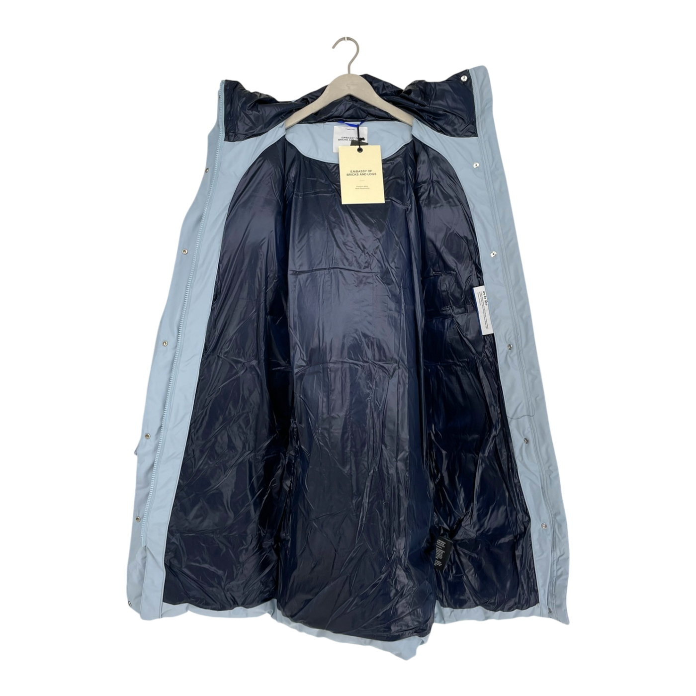 Embassy of Bricks and Logs ry puffer jacket, light blue | unisex S