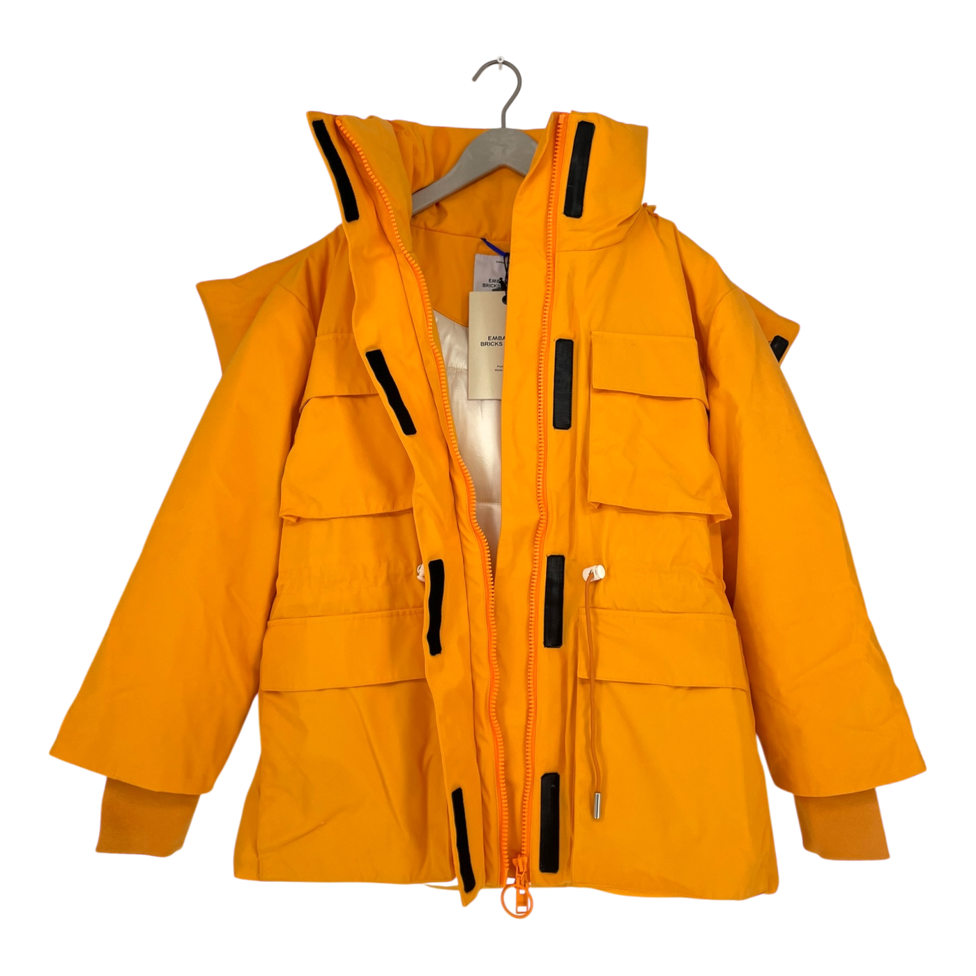 Embassy of Bricks and Logs norfolk parka, orange | unisex S