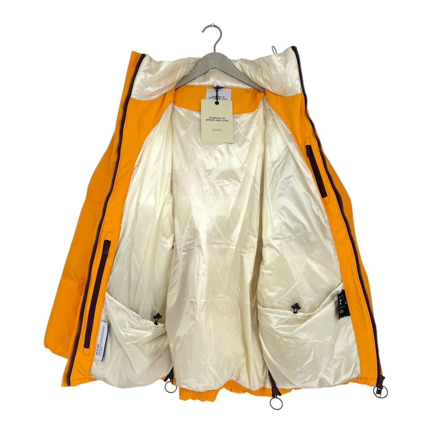 Embassy of Bricks and Logs Ekonda short parka, sun rise | unisex L