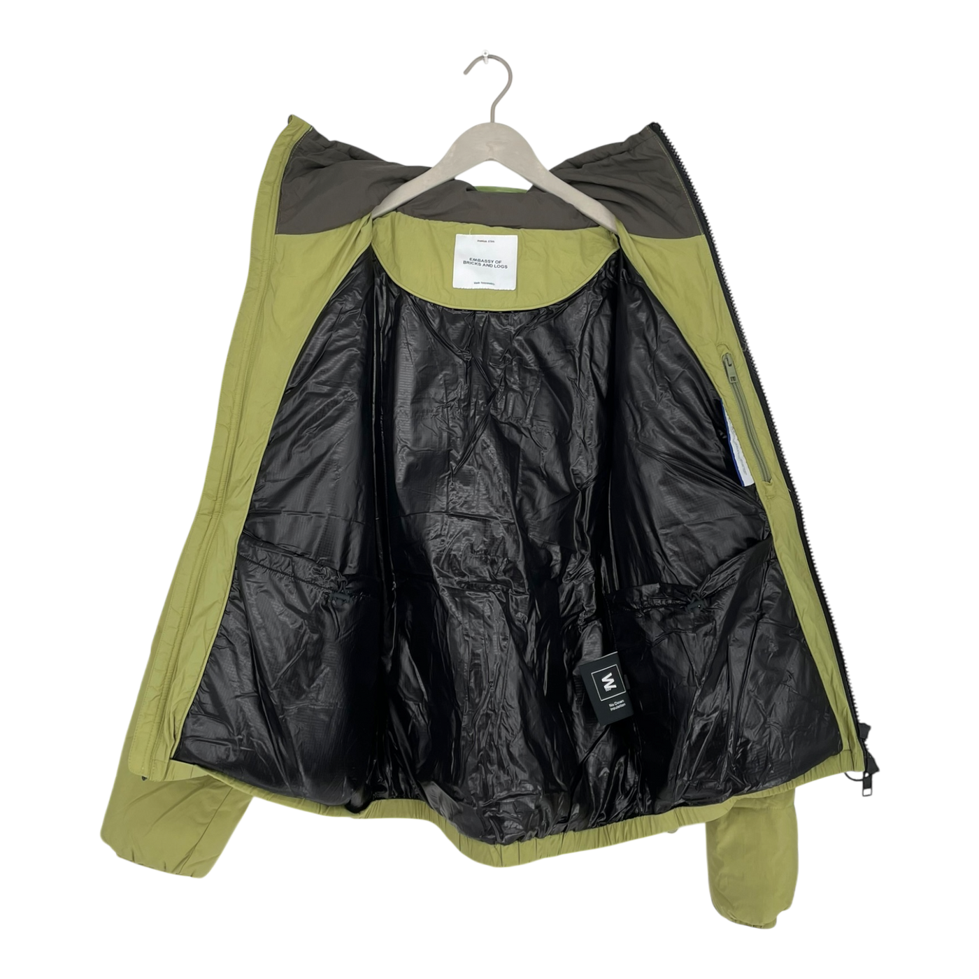 Embassy of Bricks and Logs puffer jacket, green | unisex L